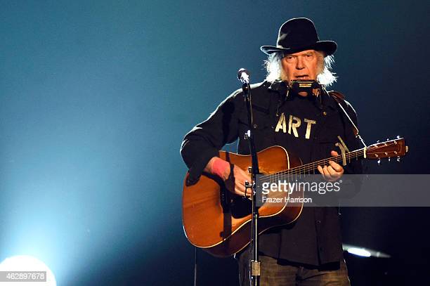 LOS ANGELES, CA - FEBRUARY 06: Singer Neil Young performs onstage at the 25th anniversary MusiCares 2015 Person Of The Year Gala honoring Bob Dylan at the Los Angeles Convention Center on February 6, 2015 in Los Angeles, California. The annual benefit raises critical funds for MusiCares' Emergency Financial Assistance and Addiction Recovery programs. (Photo by Frazer Harrison/Getty Images)