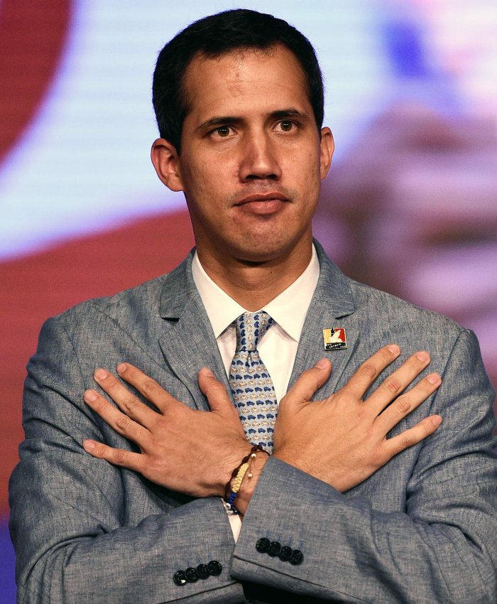 zzzzinte1The president of Venezuela's National Assembly and self-proclaimed acting president Juan Guaido gestures during a meeting with students at the Central Universidy of Venezuela (UCV) in Caracas on February 8, 2019. (Photo by Federico PARRA / AFP)zzzz
