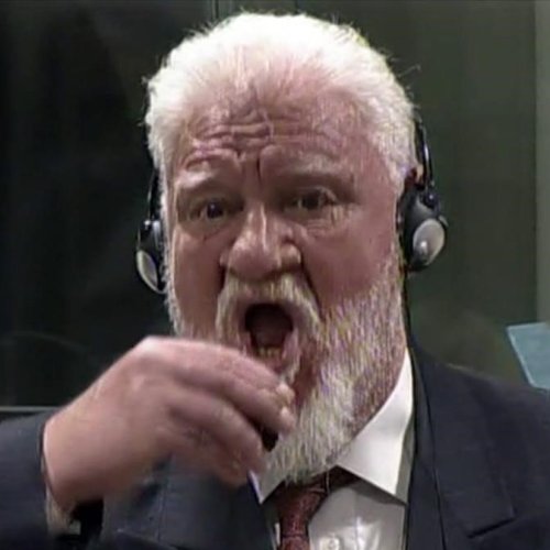 In this photo provided by the ICTY on Wednesday  Nov  29  2017  Slobodan Praljak brings a bottle to his lips  during a Yugoslav War Crimes Tribunal in The Hague  Netherlands  Praljak yelled   I am not a war criminal   and appeared to drink from a small bottle  seconds after judges reconfirmed his 20-year prison sentence for involvement in a campaign to drive Muslims out of a would-be Bosnian Croat ministate in Bosnia in the early 1990s   ICTY via AP