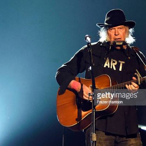 LOS ANGELES, CA - FEBRUARY 06:  Singer Neil Young performs onstage at the 25th anniversary MusiCares 2015 Person Of The Year Gala honoring Bob Dylan at the Los Angeles Convention Center on February 6, 2015 in Los Angeles, California. The annual benefit raises critical funds for MusiCares' Emergency Financial Assistance and Addiction Recovery programs.  (Photo by Frazer Harrison/Getty Images)